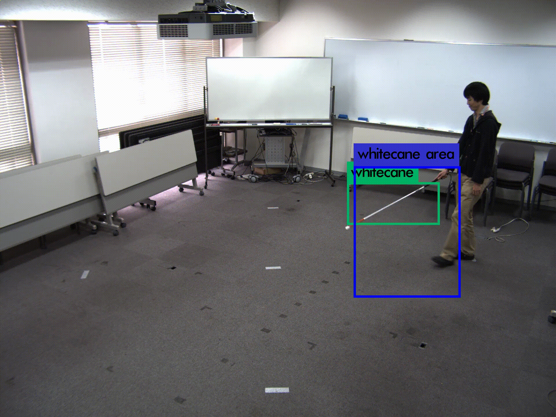 White cane detection from surveillance camera video
